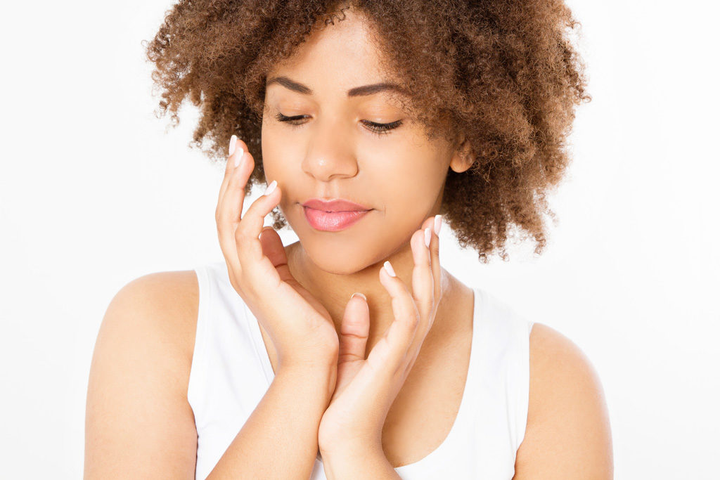 Beautiful young african american woman isolated on white background. Copy space. Mock up. Skin care, spa and make up concept. Summer time. Afro girl curly hair
